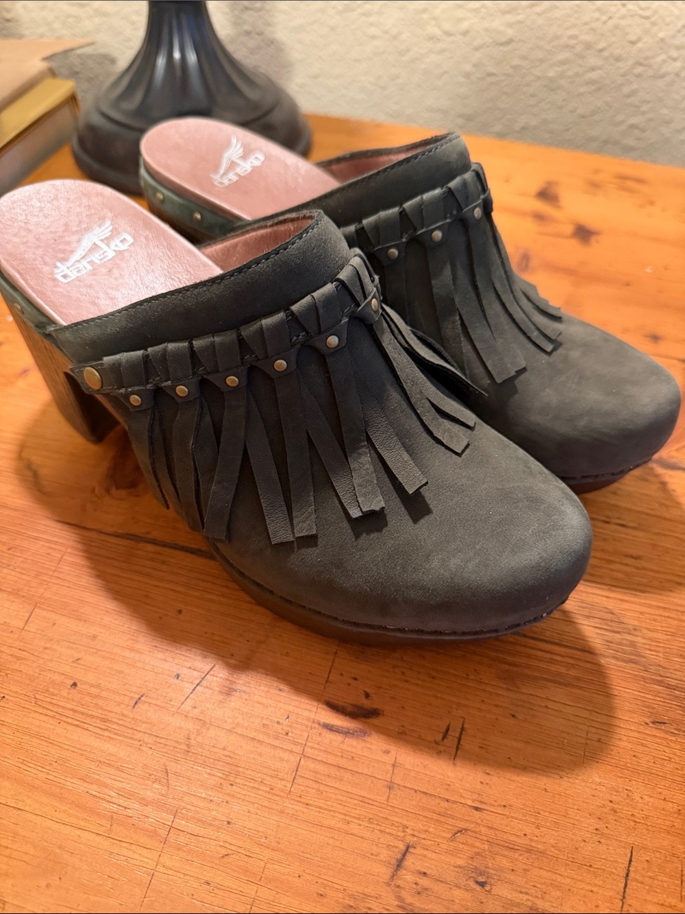 Dansko Black Suede Fringe Clog Mules with Stud Accents